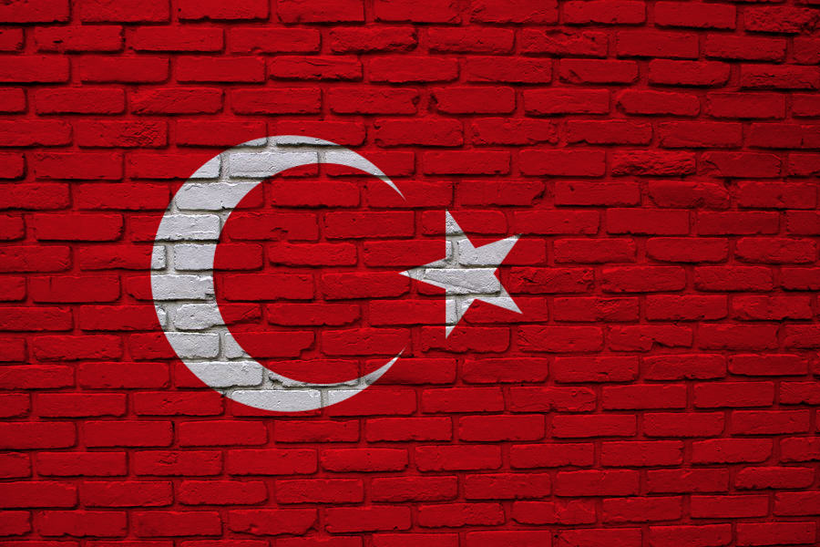 Turkish Flag on Brick Background